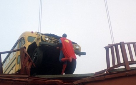 Superman stopping a bus
